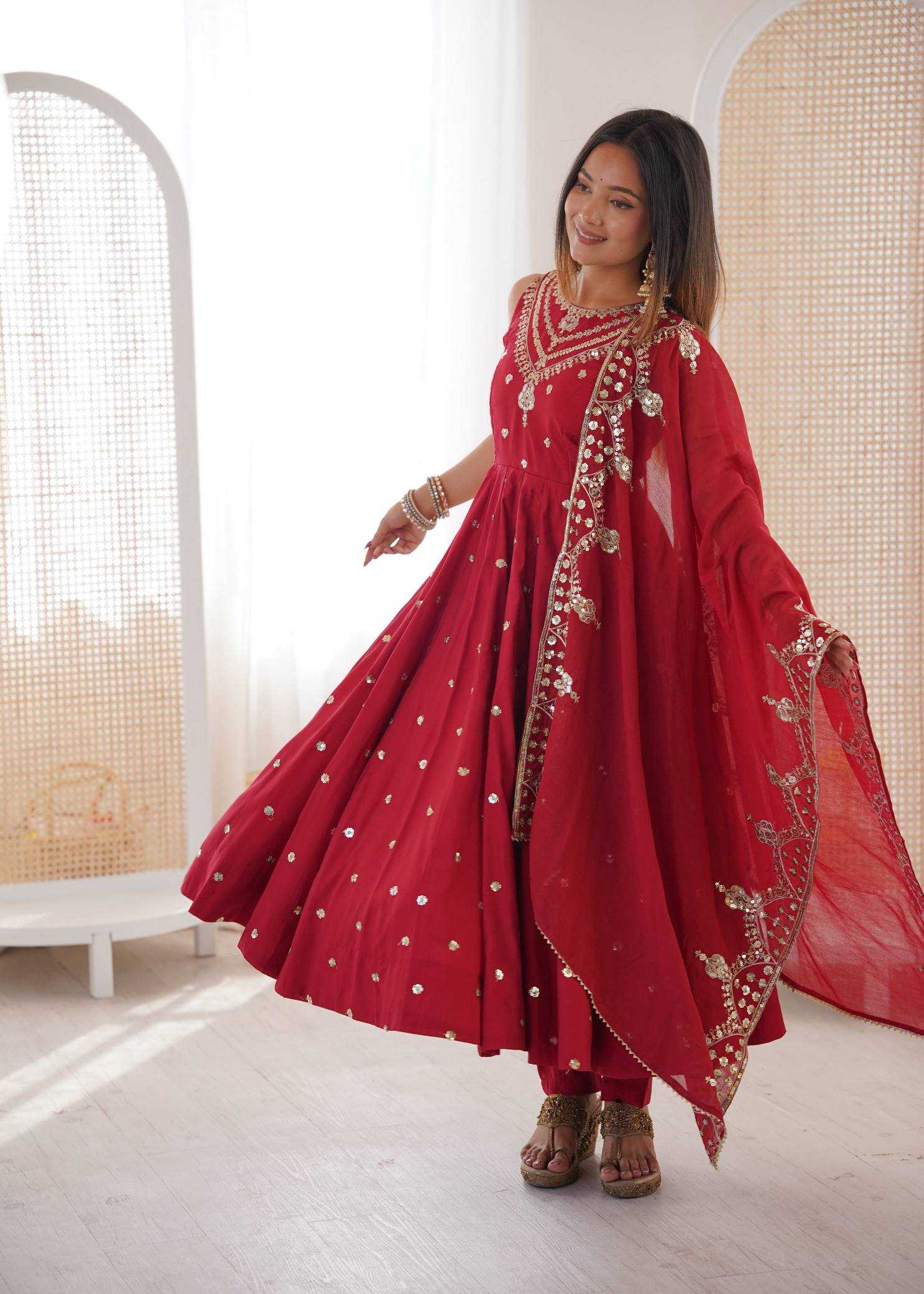 YNF Wholesale Heavy Roman Silk Embroidery Gowns  | Surat Manufacturer