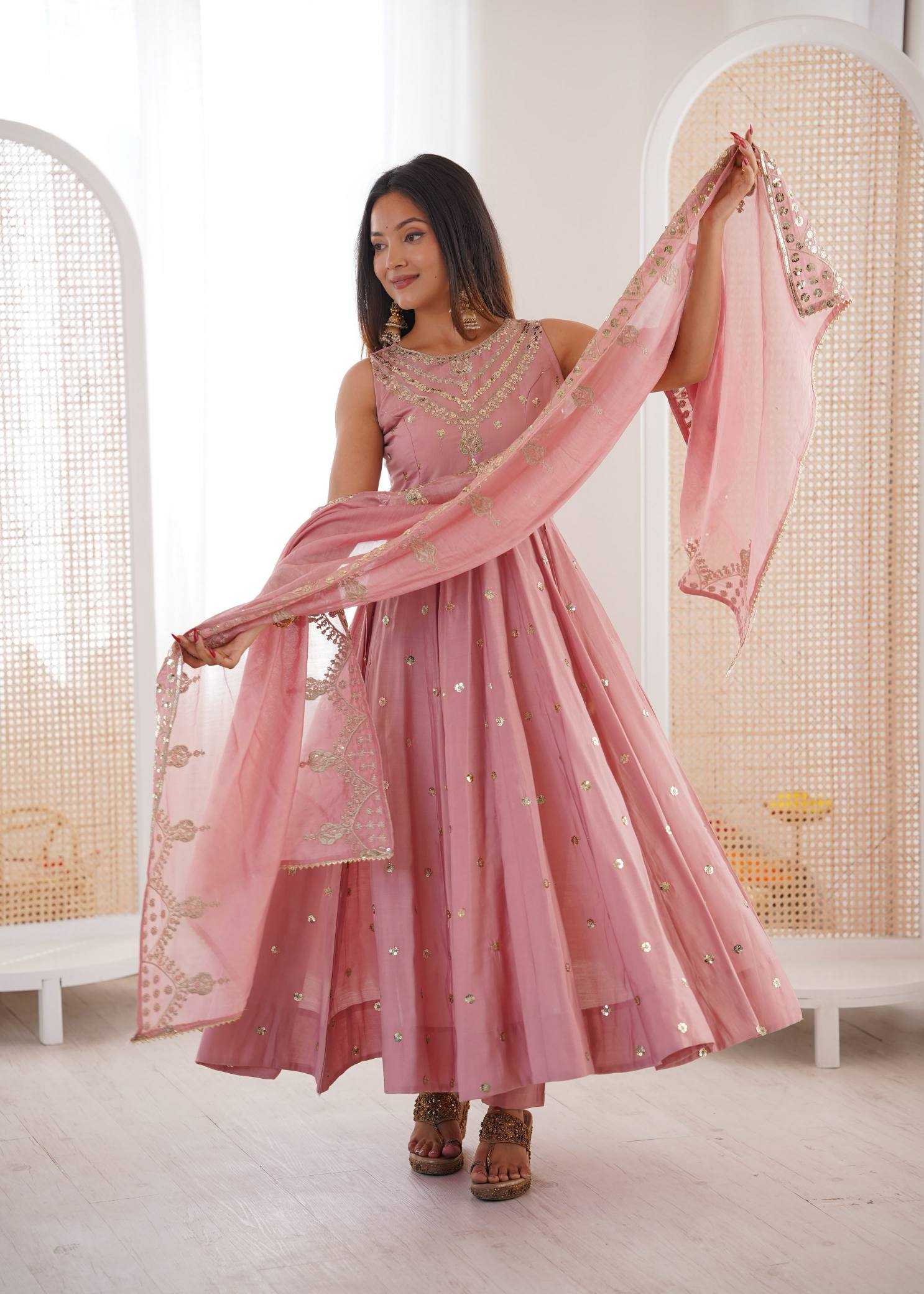 YNF Wholesale Heavy Roman Silk Embroidery Gowns  | Surat Manufacturer