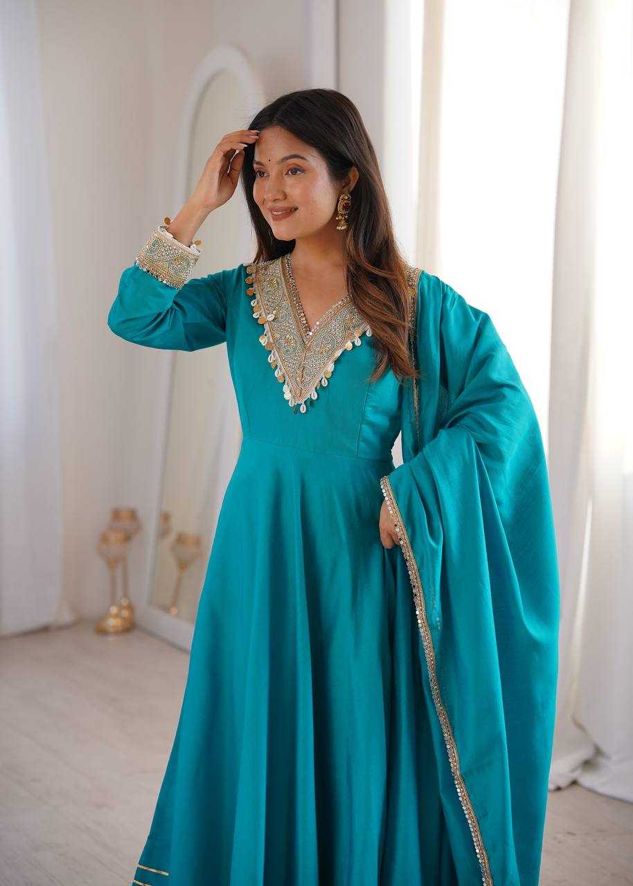 YNF Wholesale Heavy Roman Silk Embroidery Gowns  | Surat Manufacturer