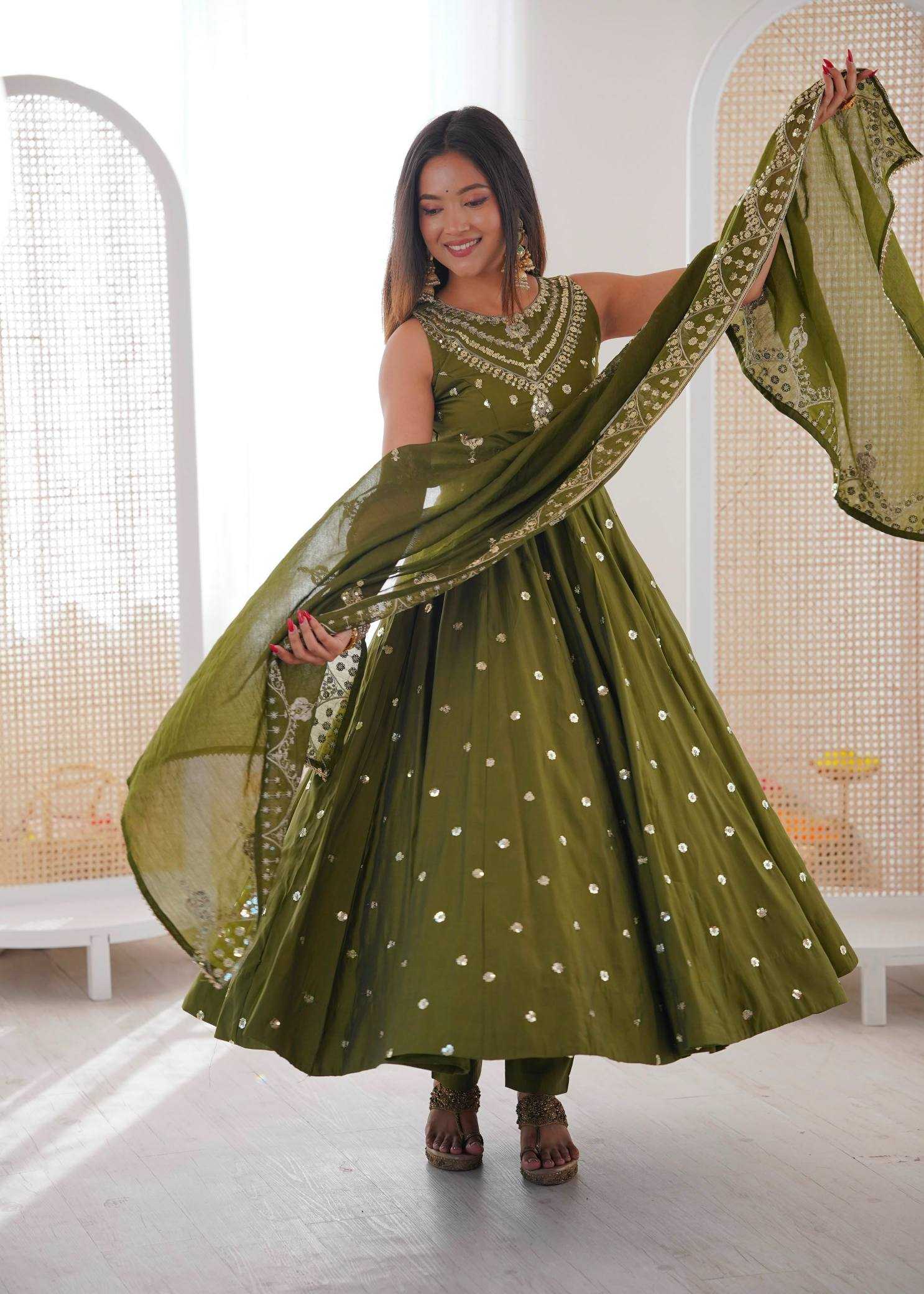 YNF Wholesale Heavy Roman Silk Embroidery Gowns  | Surat Manufacturer