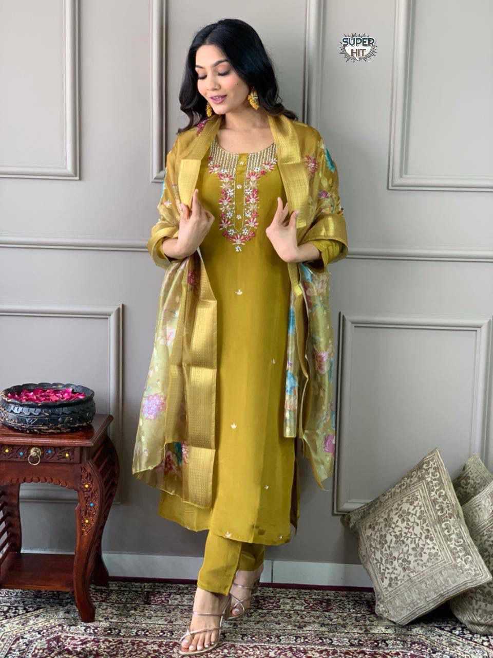 YNF Wholesale Heavy Roman Silk Ladies Suits  | Surat Manufacturer