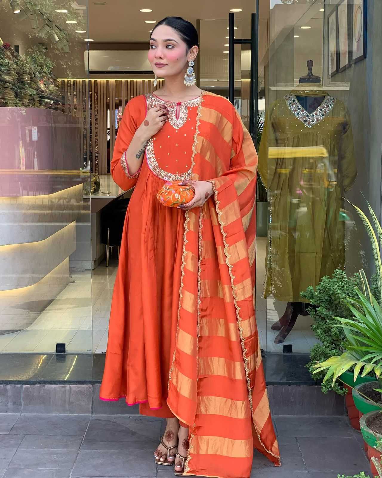 YNF Wholesale Heavy Roman Silk Embroidery Suits  | Surat Manufacturer