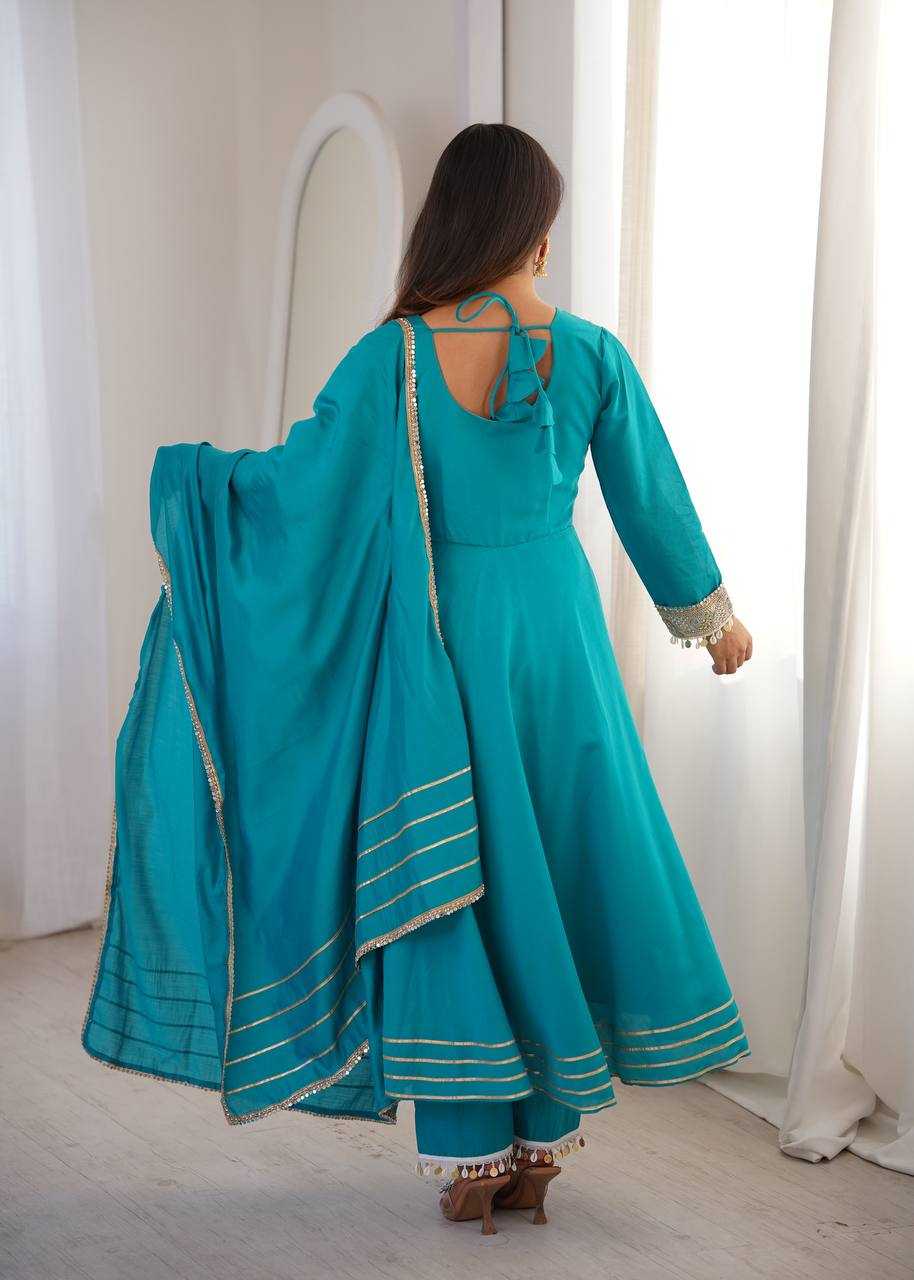 YNF Wholesale Heavy Roman Silk Embroidery Gowns  | Surat Manufacturer