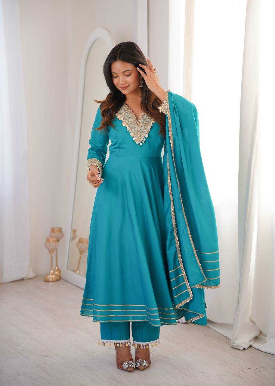 YNF Wholesale Heavy Roman Silk Embroidery Gowns  | Surat Manufacturer