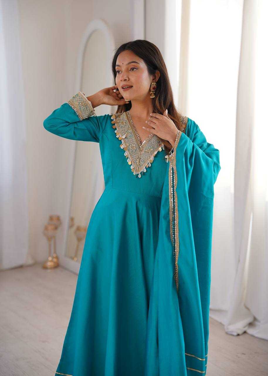 YNF Wholesale Heavy Roman Silk Embroidery Gowns  | Surat Manufacturer