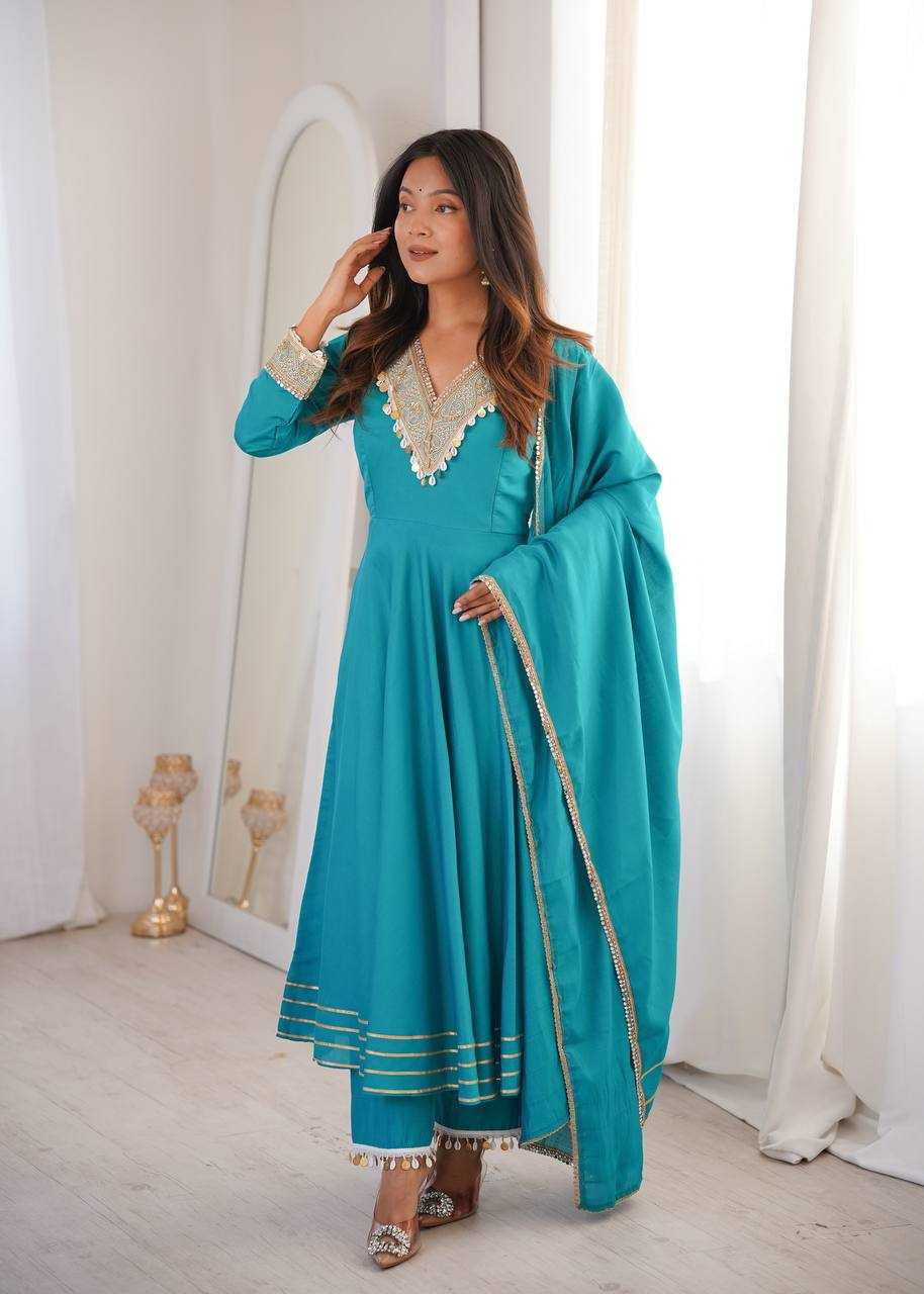 YNF Wholesale Heavy Roman Silk Embroidery Gowns  | Surat Manufacturer