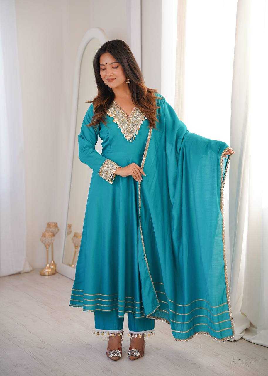 YNF Wholesale Heavy Roman Silk Embroidery Gowns  | Surat Manufacturer