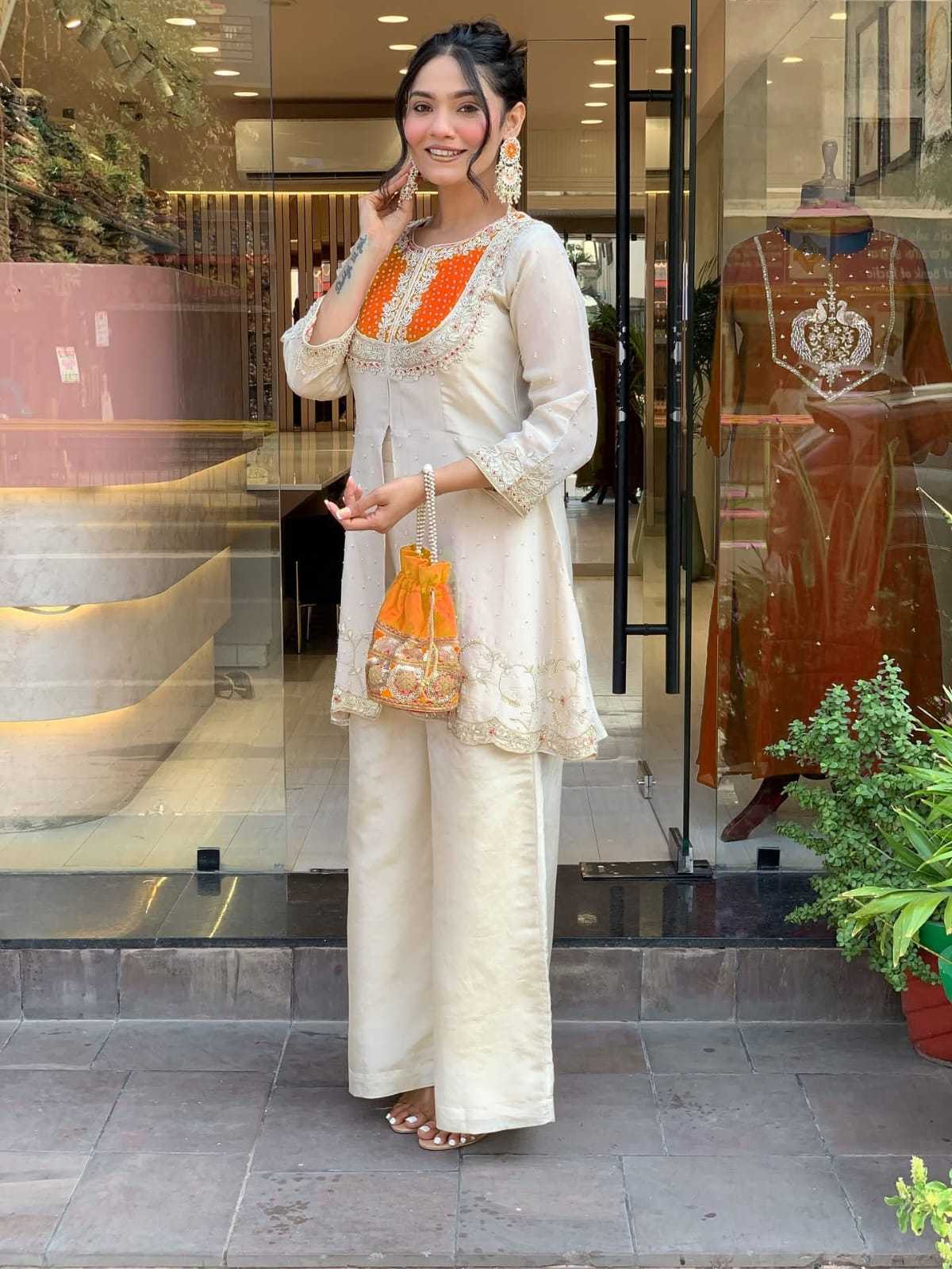 YNF Wholesale Heavy Roman Silk Embroidery Suits  | Surat Manufacturer