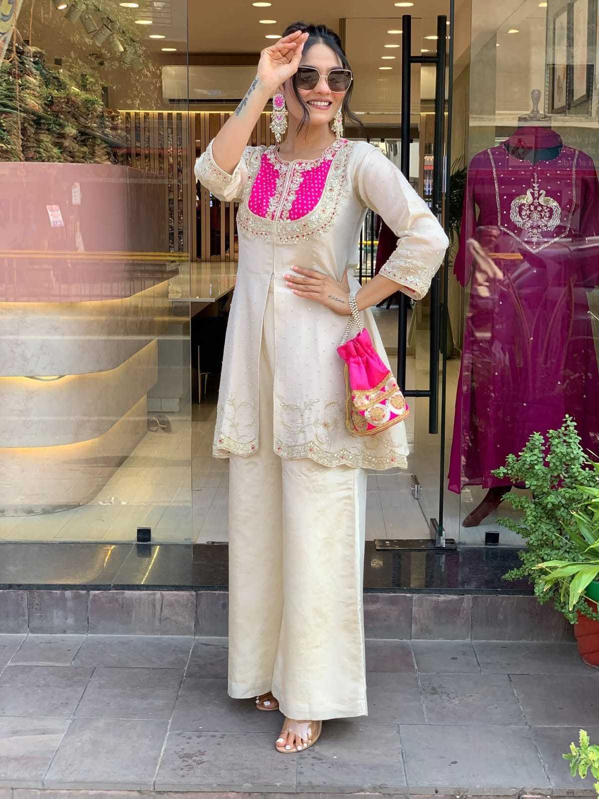 YNF Wholesale Heavy Roman Silk Embroidery Suits  | Surat Manufacturer