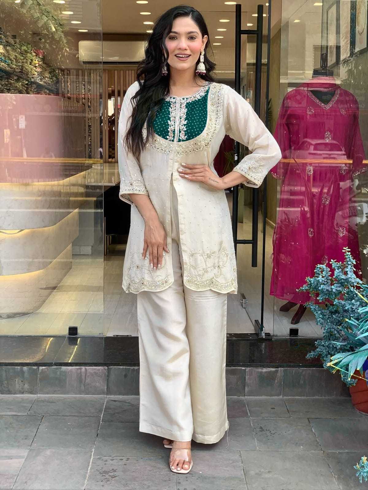 YNF Wholesale Heavy Roman Silk Embroidery Suits  | Surat Manufacturer