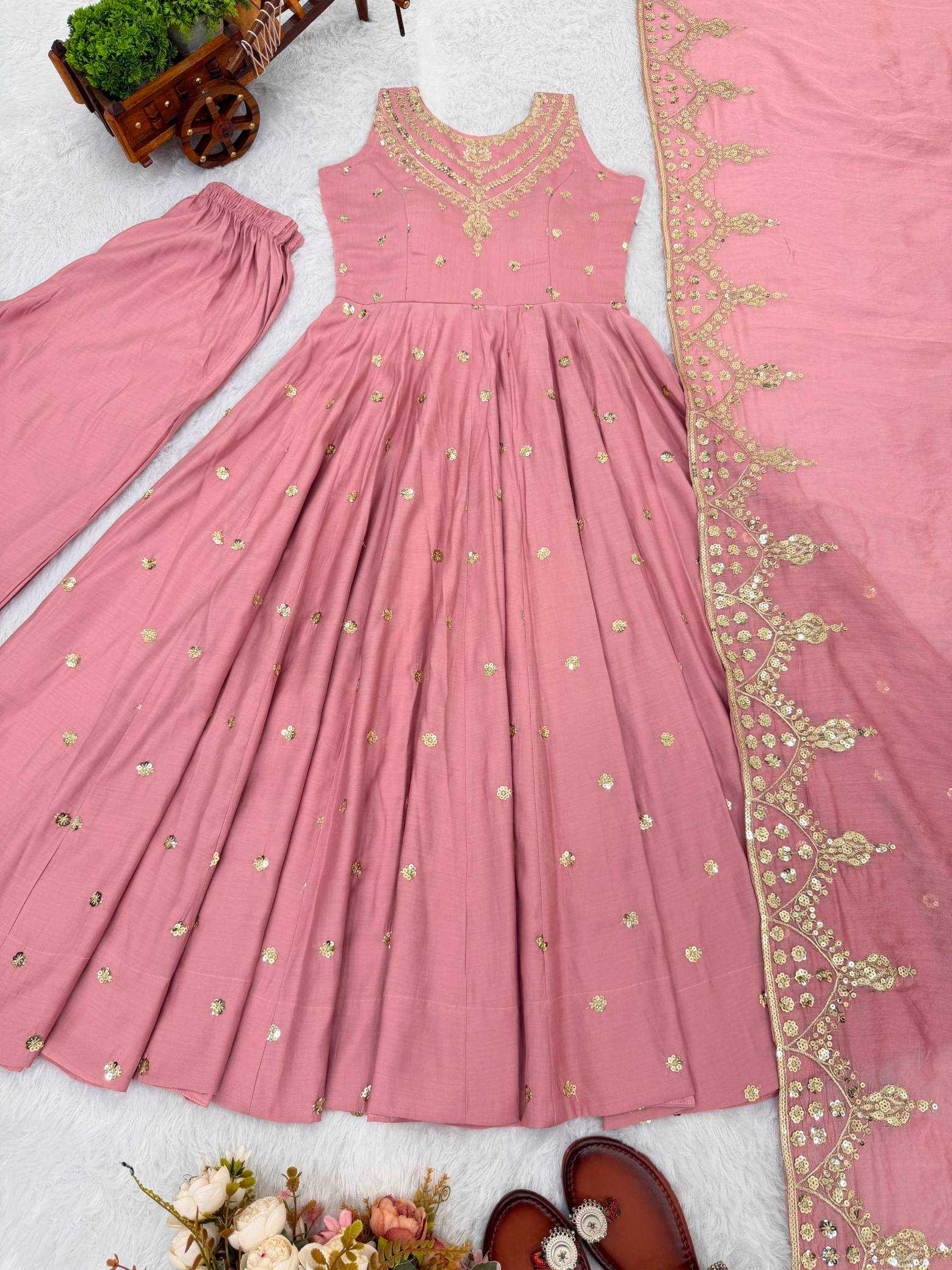 YNF Wholesale Heavy Roman Silk Embroidery Gowns  | Surat Manufacturer