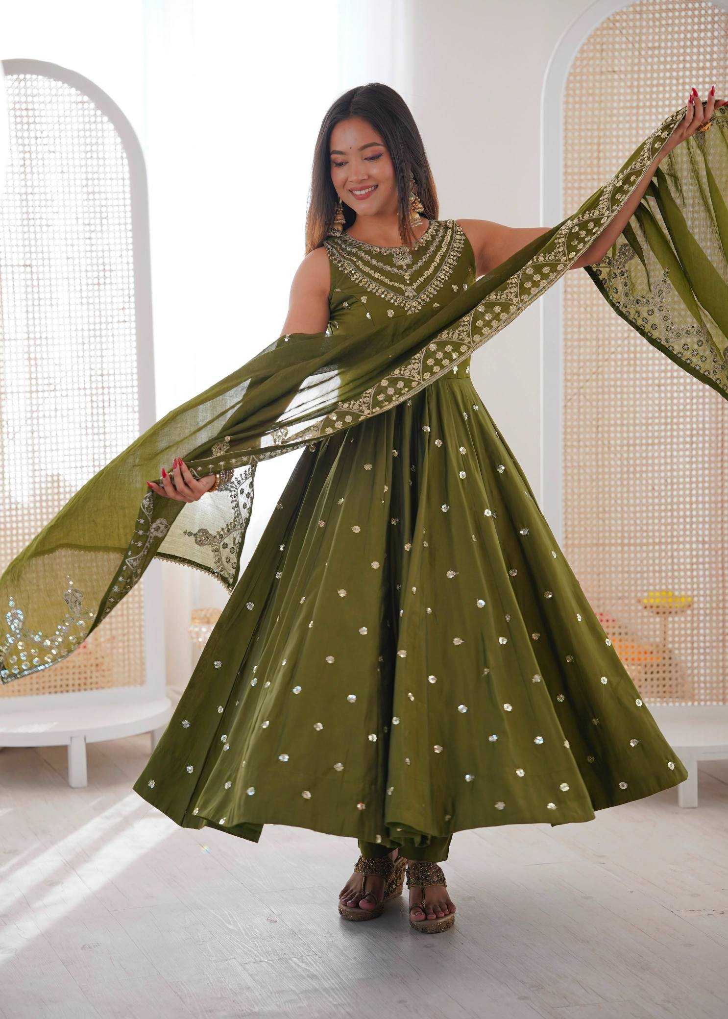 YNF Wholesale Heavy Roman Silk Embroidery Gowns  | Surat Manufacturer