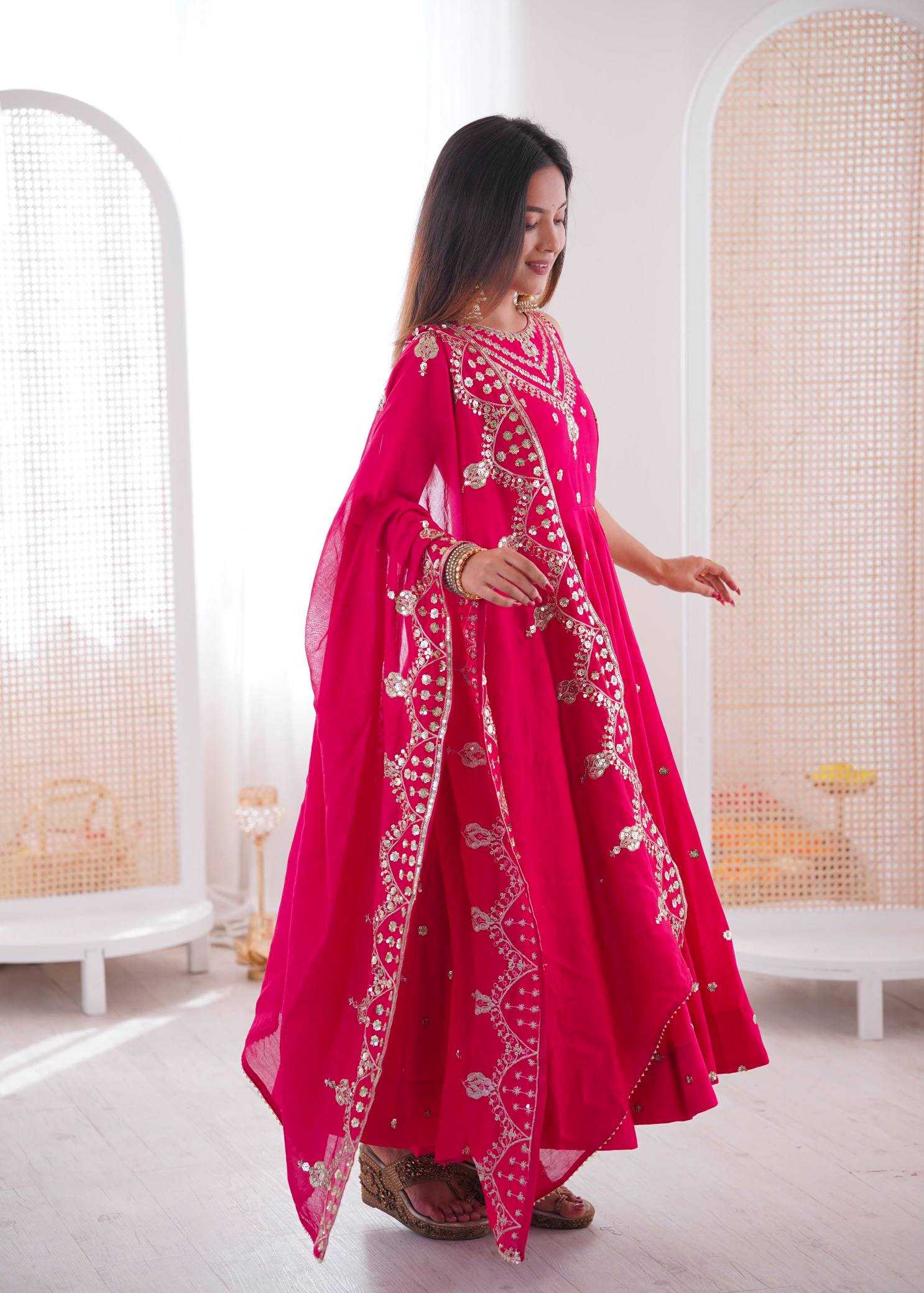 YNF Wholesale Heavy Roman Silk Embroidery Gowns  | Surat Manufacturer