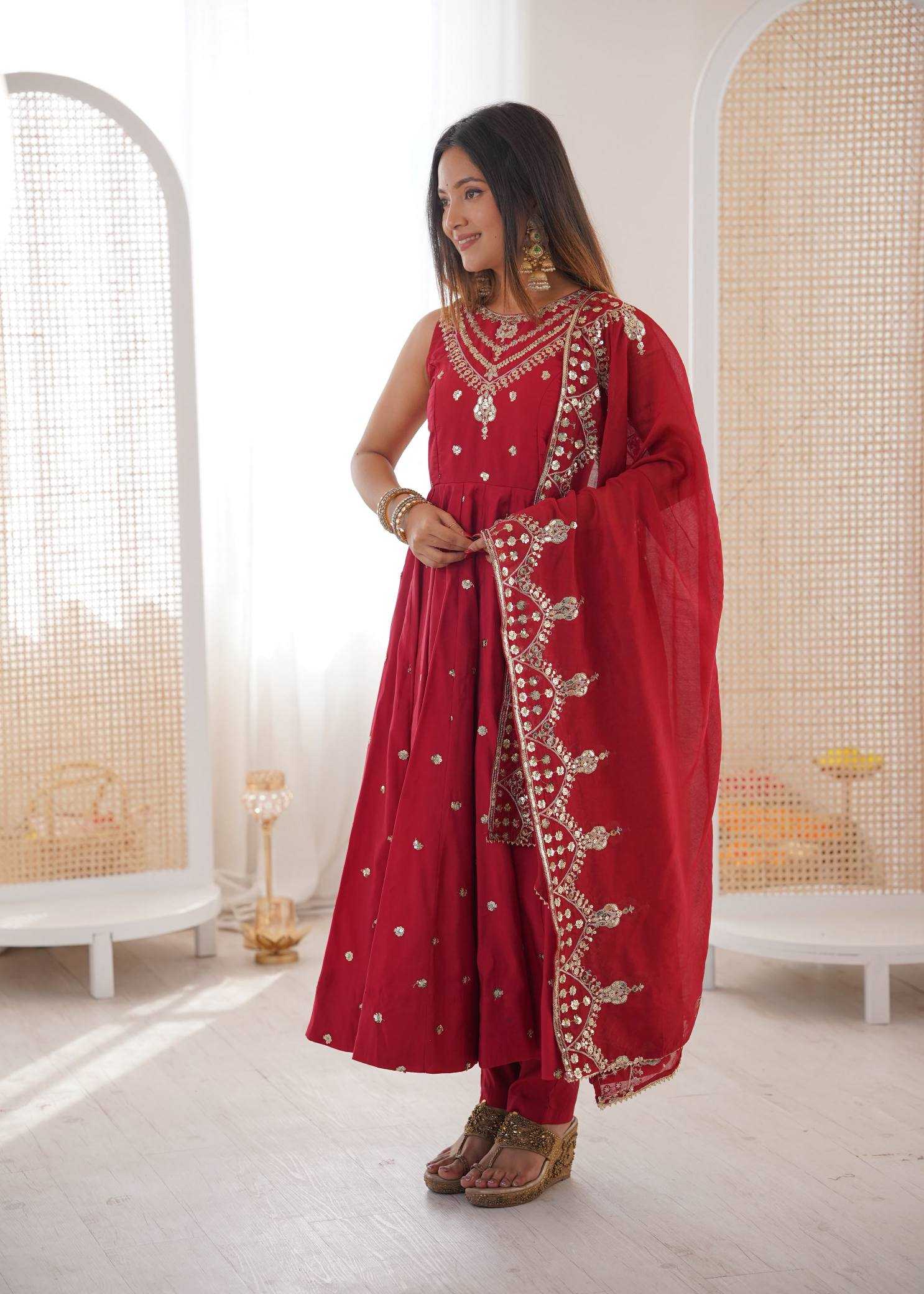 YNF Wholesale Heavy Roman Silk Embroidery Gowns  | Surat Manufacturer