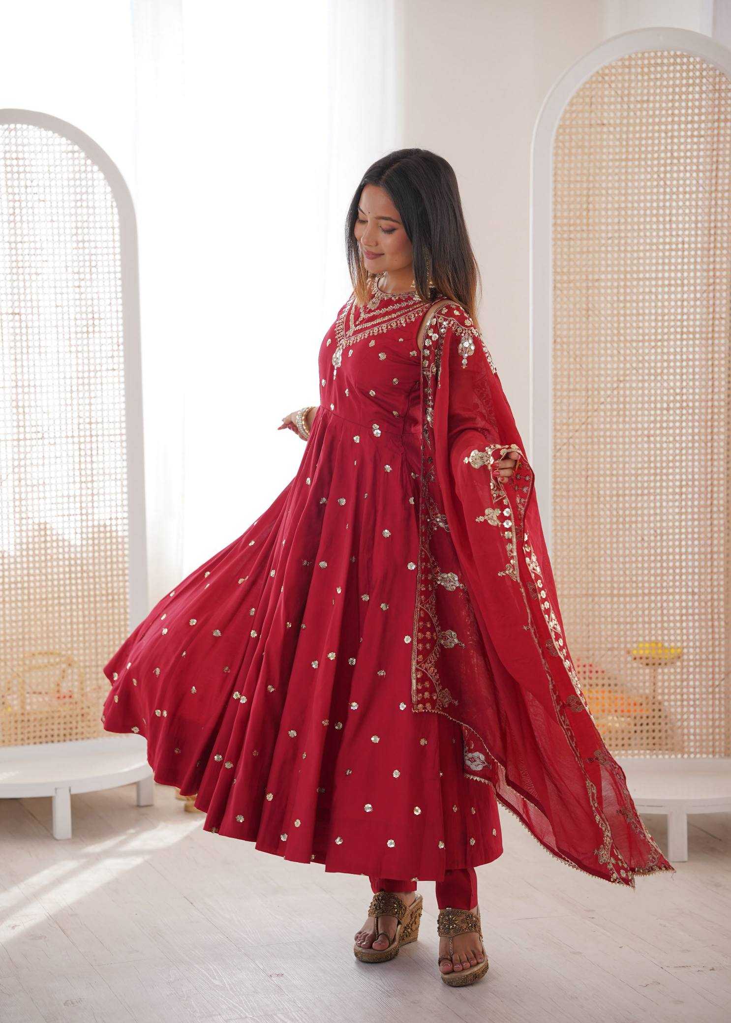 YNF Wholesale Heavy Roman Silk Embroidery Gowns  | Surat Manufacturer