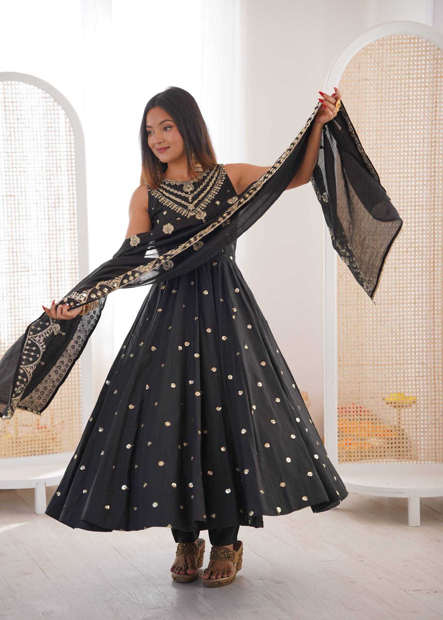 YNF Wholesale Heavy Roman Silk Embroidery Gowns  | Surat Manufacturer