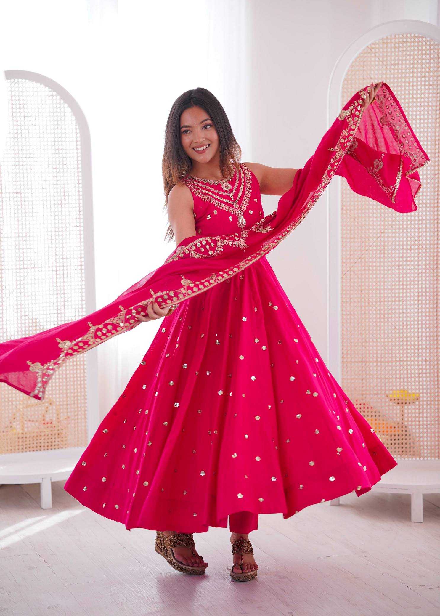 YNF Wholesale Heavy Roman Silk Embroidery Gowns  | Surat Manufacturer