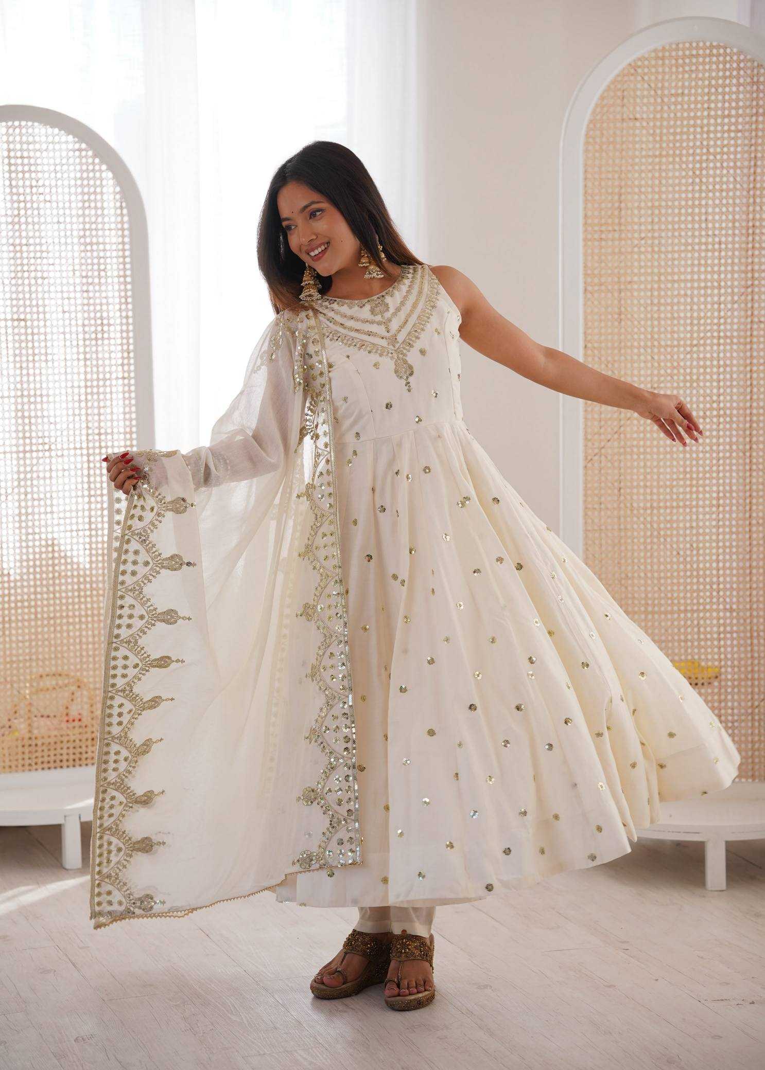 YNF Wholesale Heavy Roman Silk Embroidery Gowns  | Surat Manufacturer