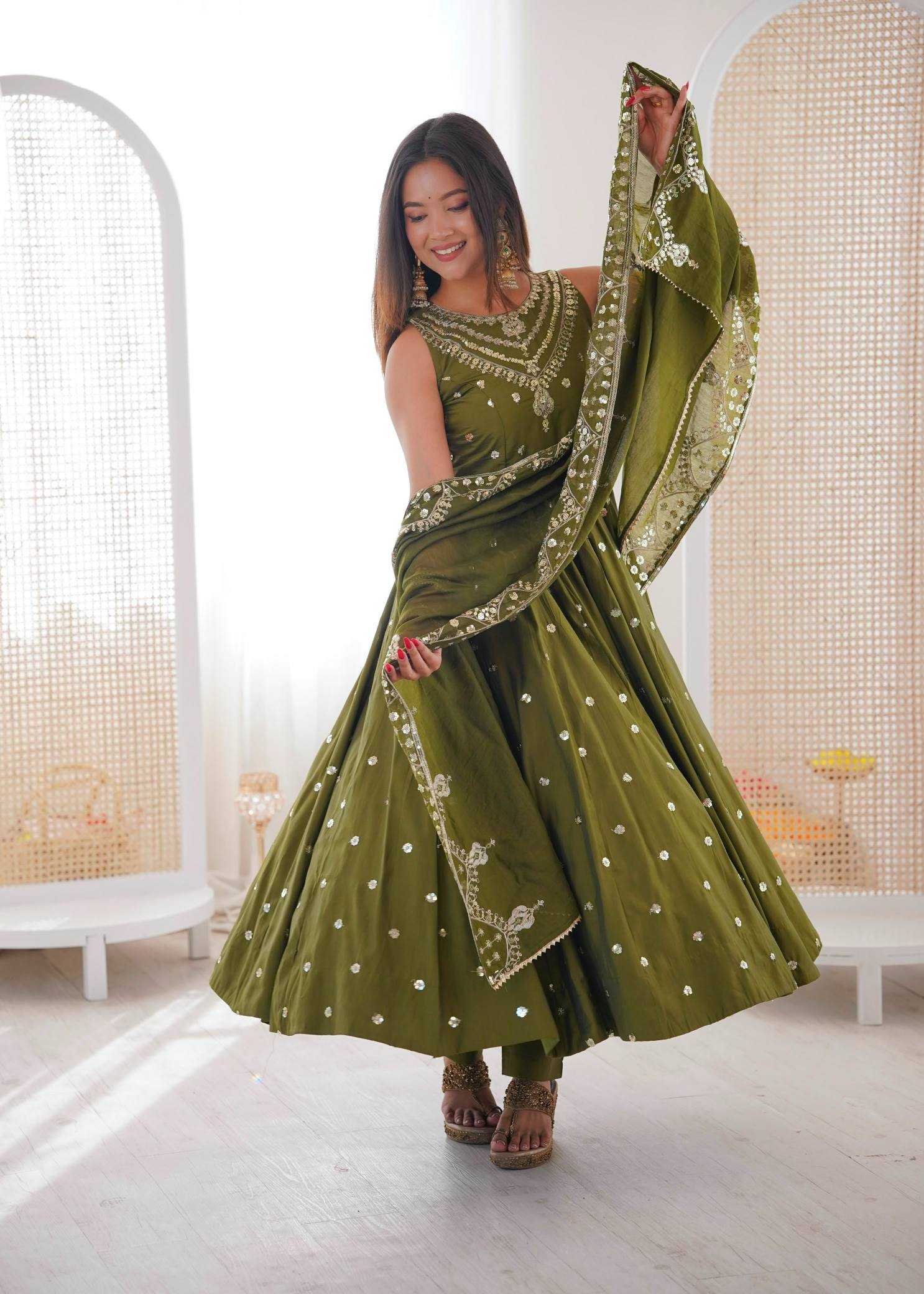 YNF Wholesale Heavy Roman Silk Embroidery Gowns  | Surat Manufacturer
