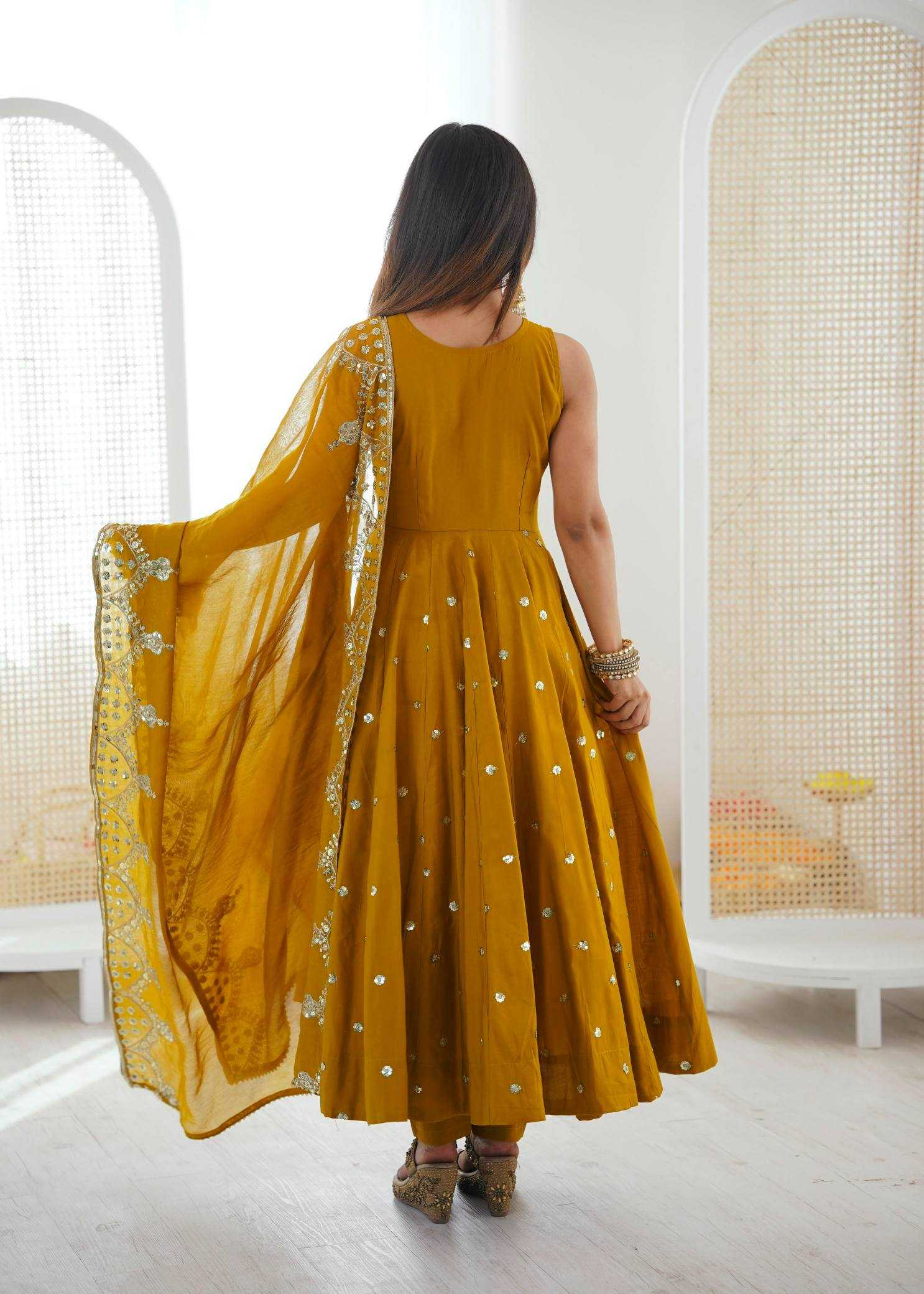 YNF Wholesale Heavy Roman Silk Embroidery Gowns  | Surat Manufacturer