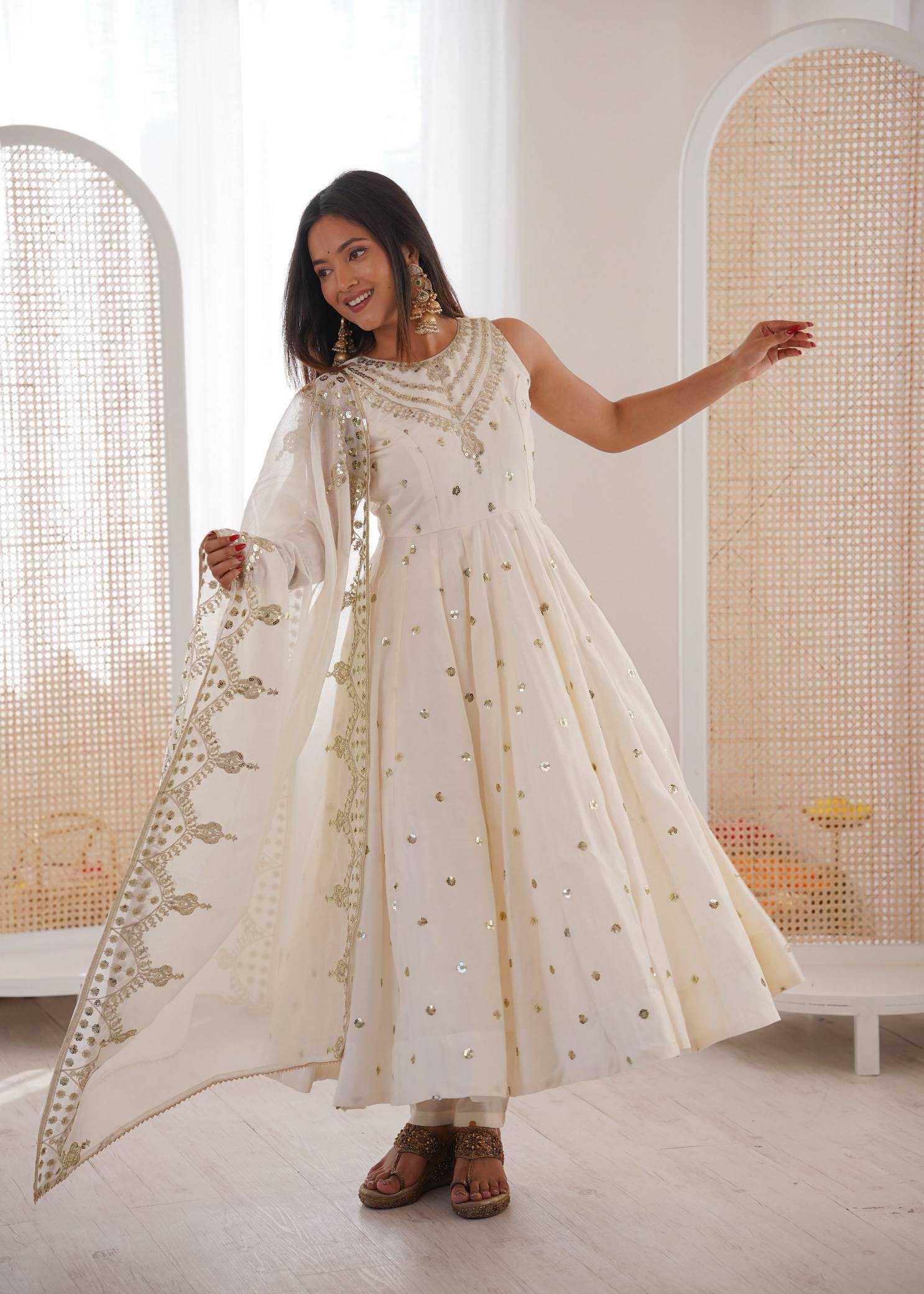 YNF Wholesale Heavy Roman Silk Embroidery Gowns  | Surat Manufacturer
