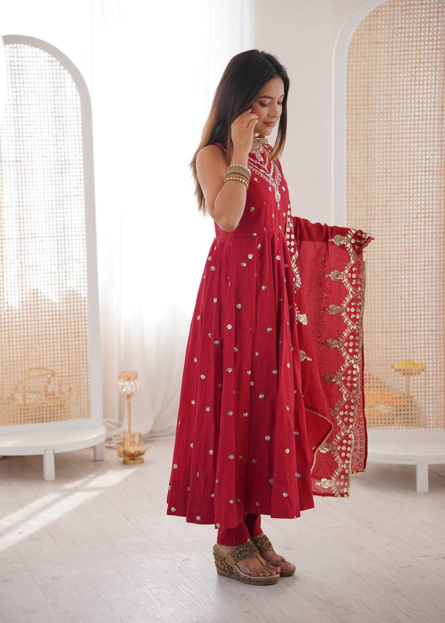 YNF Wholesale Heavy Roman Silk Embroidery Gowns  | Surat Manufacturer