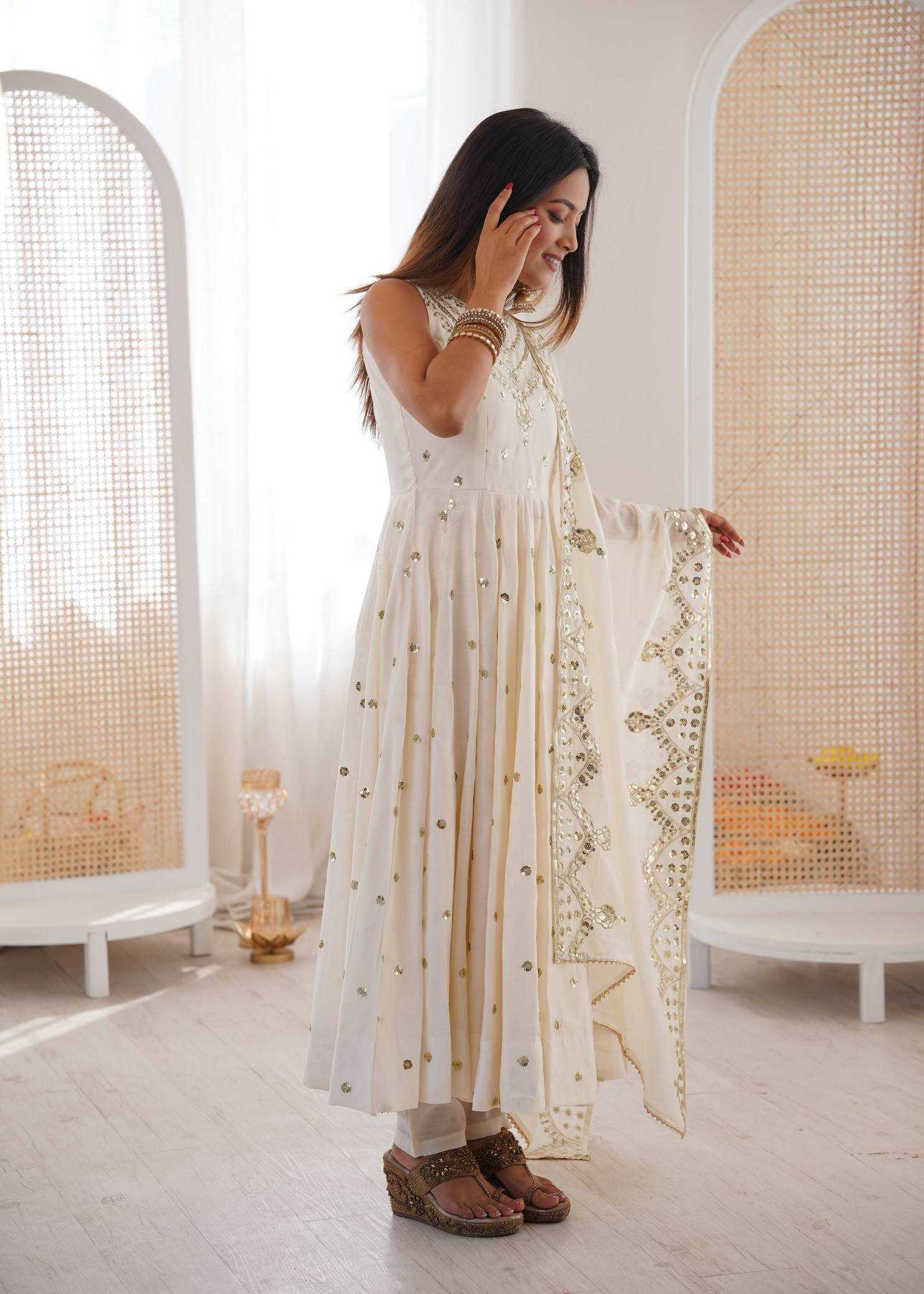 YNF Wholesale Heavy Roman Silk Embroidery Gowns  | Surat Manufacturer