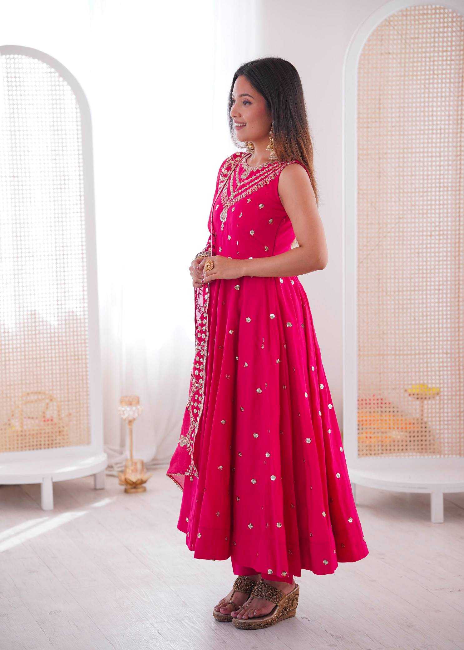 YNF Wholesale Heavy Roman Silk Embroidery Gowns  | Surat Manufacturer