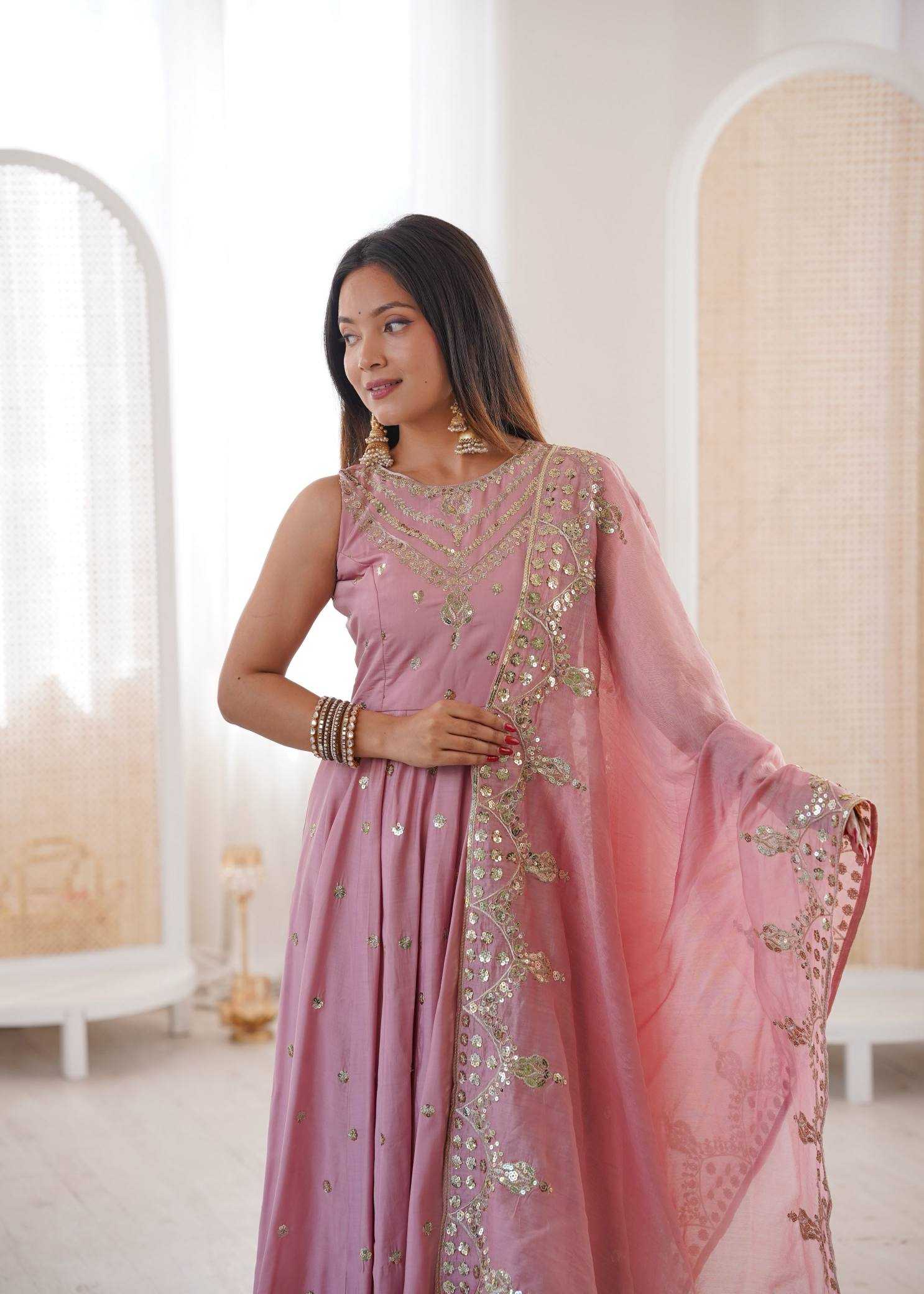 YNF Wholesale Heavy Roman Silk Embroidery Gowns  | Surat Manufacturer