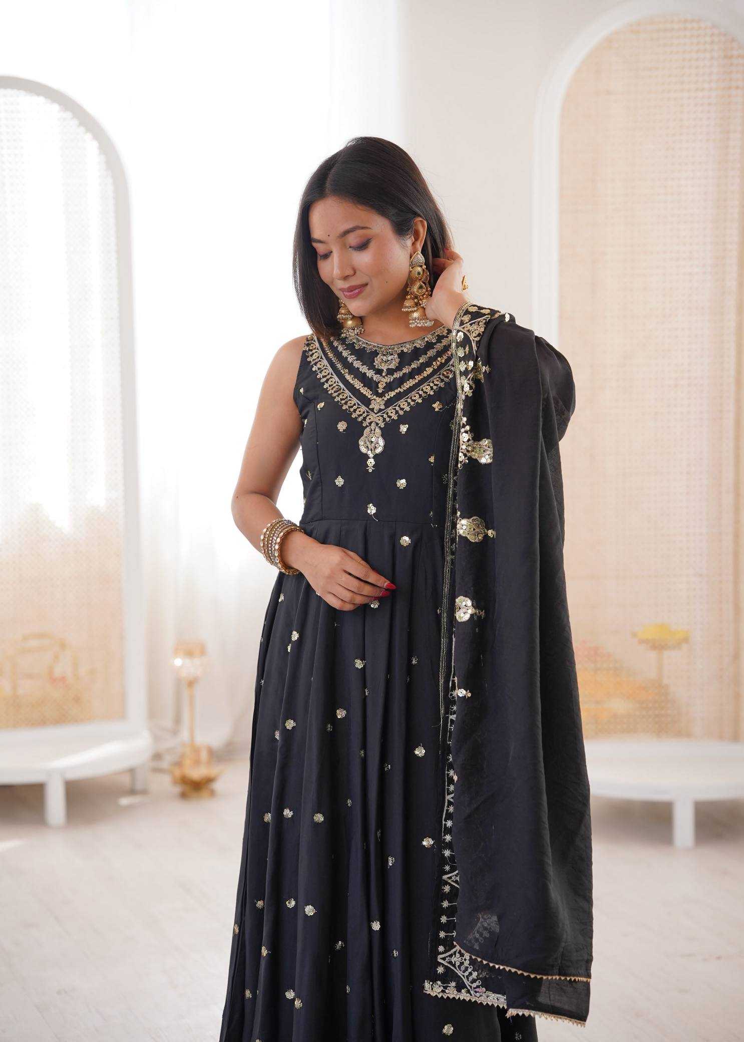 YNF Wholesale Heavy Roman Silk Embroidery Gowns  | Surat Manufacturer