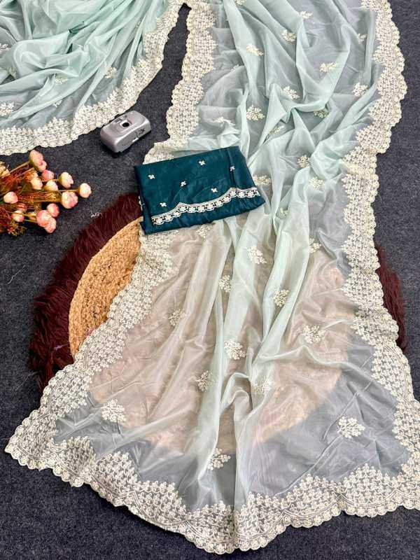 YNF Wholesale Heavy Roman Silk Party Wear Silk Sarees  | Surat Manufacturer