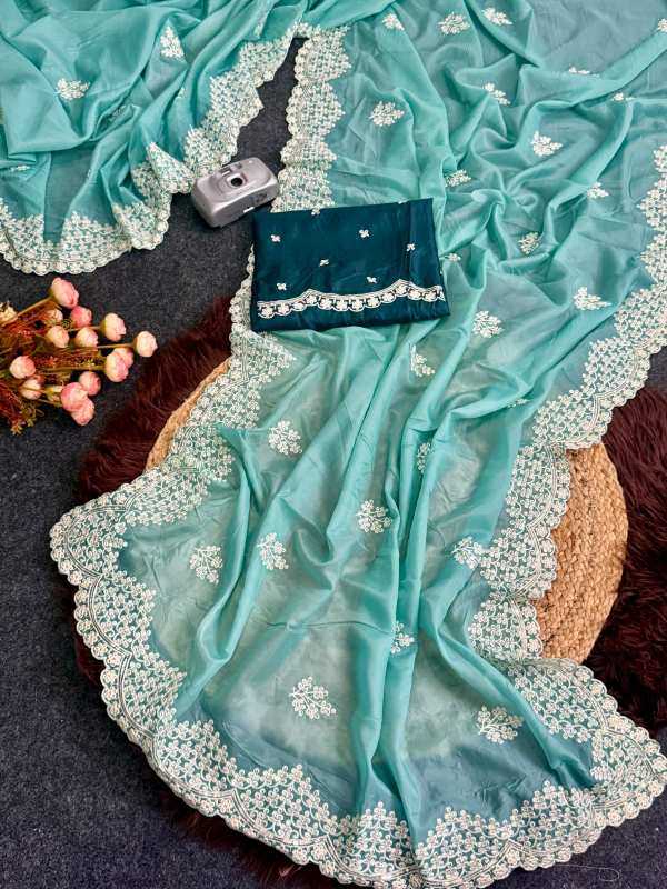YNF Wholesale Heavy Roman Silk Party Wear Silk Sarees  | Surat Manufacturer