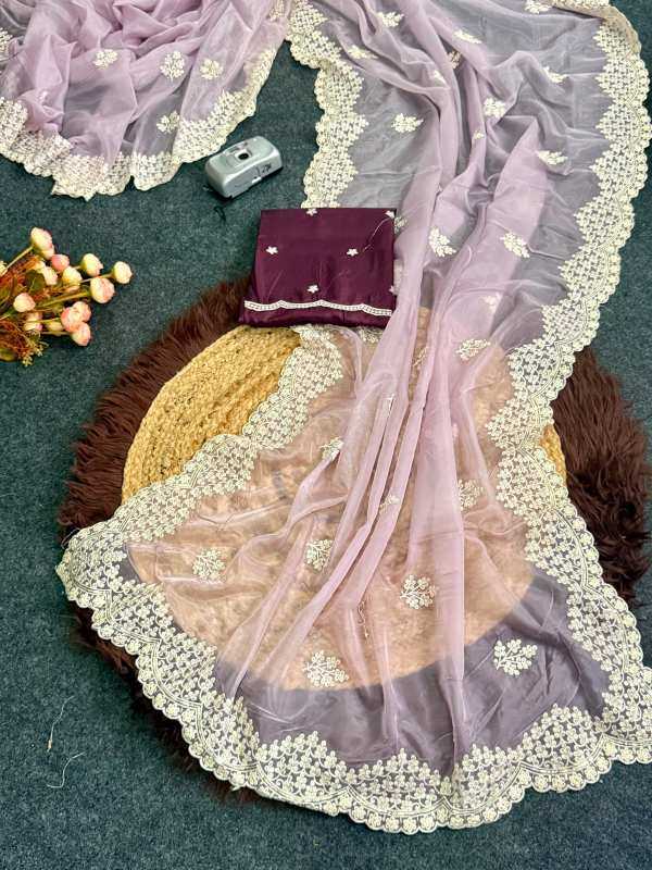 YNF Wholesale Heavy Roman Silk Party Wear Silk Sarees  | Surat Manufacturer